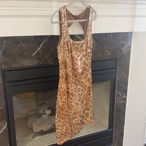 Cache pen back mini dress subtle animal print.